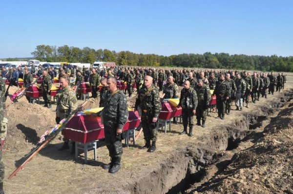 Запорожцы провели в последний путь 56 неизвестных бойцов АТО (Фото)