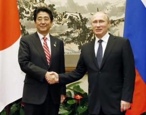 Japan’s Abe urges Putin to ensure Ukraine ceasefire holds