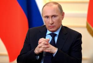 Putin says Western spies plot against Russia before polls