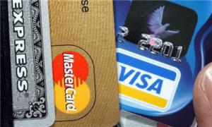Нацбанк запретил выдачу валюты с платежных карт