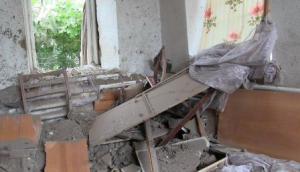 Разрушенные дома в Сартане после обстрела боевиков (Фото)