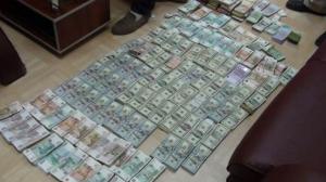 В Запорожской области разоблачили «обменник» боевиков: 4 млн грн и полмиллиона долларов (Фото, Видео)