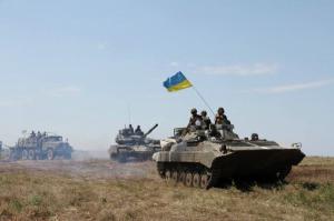 Украина начала отвод легкого вооружения на Донбассе