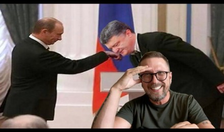 Порошенко поцеловал руку Путину